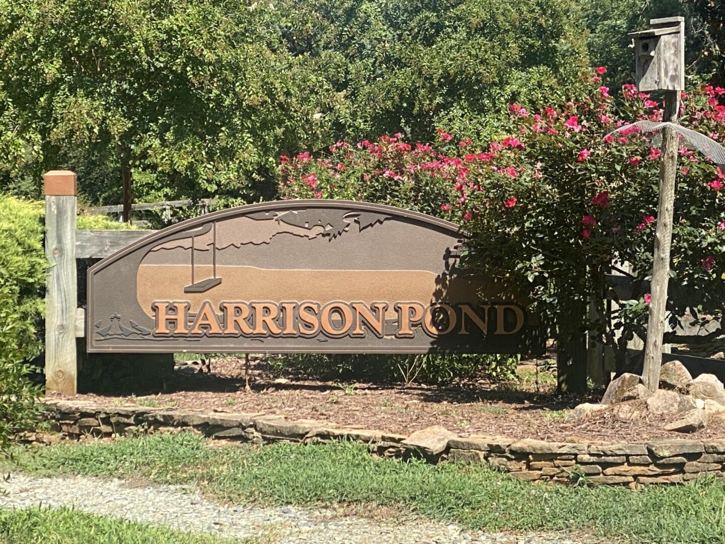 Unique Design Sign on Harrison Pond
