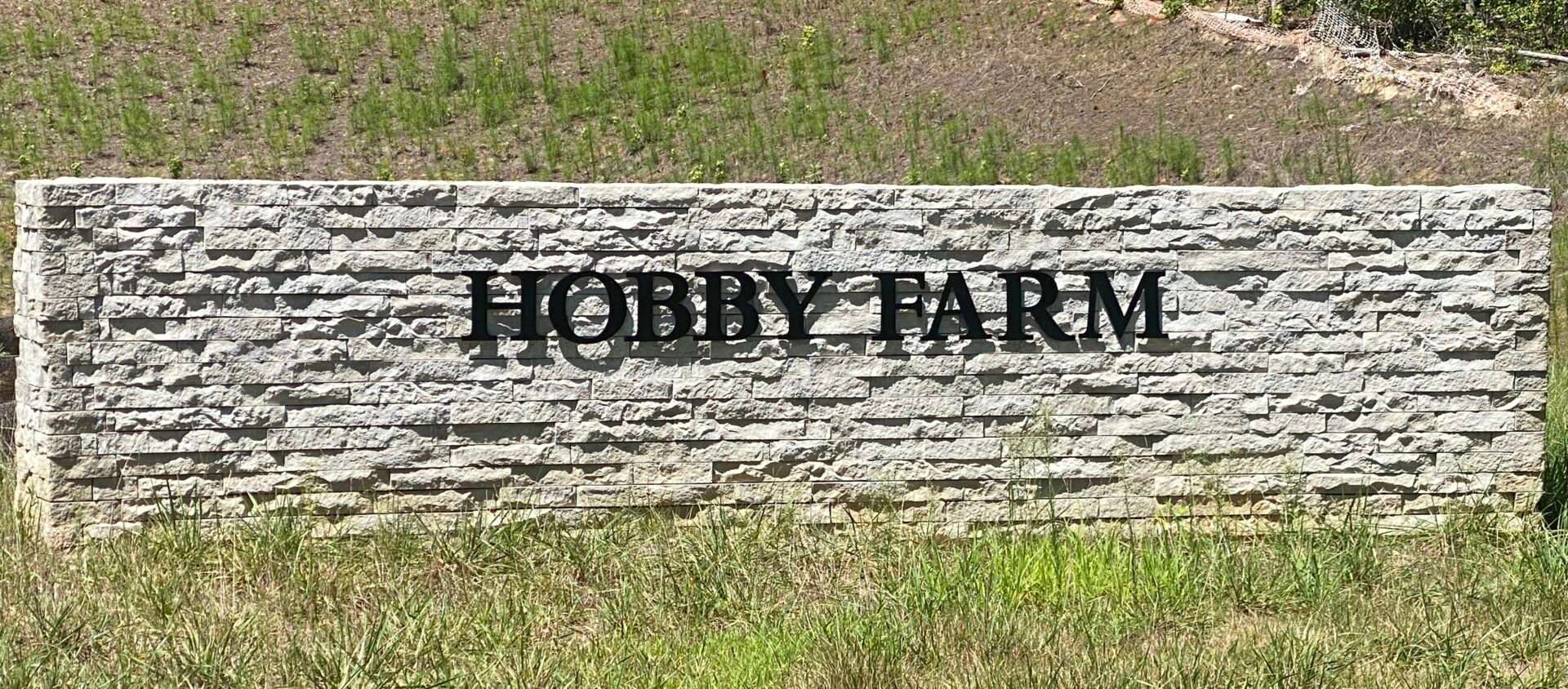 Hobby Farm Name on a Wall Outside
