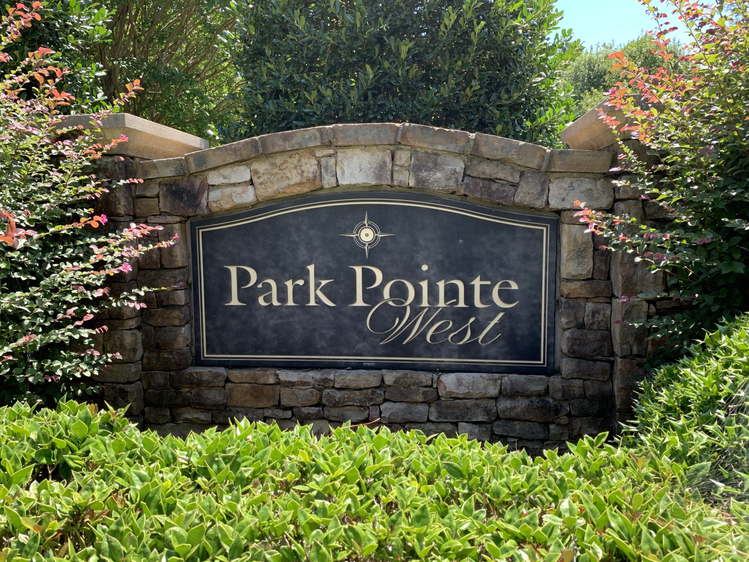 Park Point West Sign Board On A Wall